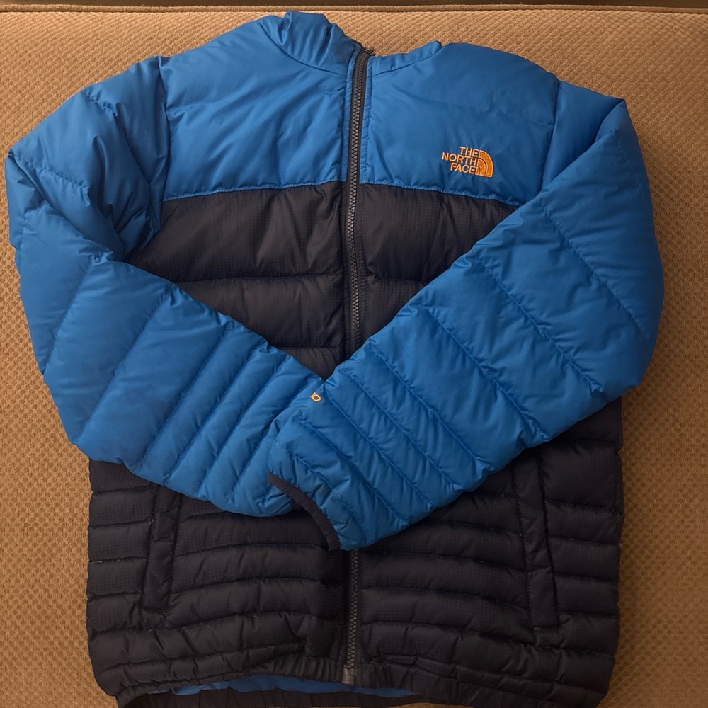 The North Face Kid’s Blue and Black Puffer Jacket